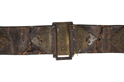 Lot 215 - A SAFAVID LEATHER BELT WITH STEEL BUCKLE AND OPENWORK BRASS FITTINGS