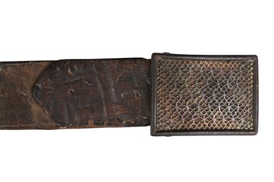 Lot 215 - A SAFAVID LEATHER BELT WITH STEEL BUCKLE AND OPENWORK BRASS FITTINGS