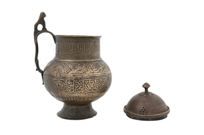 Lot 185 - A PERSIAN BRASS WINE JUG WITH LID