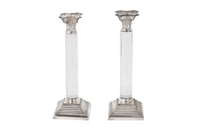 Lot 72 - A NEAR PAIR OF VINTAGE NEOCLASSICAL SILVER-PLATED AND GLASS CANDLESTICKS