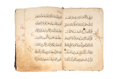 Lot 9 - TWO ILLUMINATED QUR'AN SECTIONS: JUZ IV AND JUZ XXI