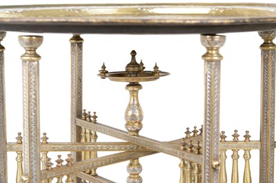 Lot 193 - A MAMLUK-REVIVAL DAMASCUS-WARE SILVER AND COPPER-INLAID BRASS OCCASIONAL TABLE