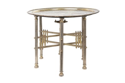 Lot 193 - A MAMLUK-REVIVAL DAMASCUS-WARE SILVER AND COPPER-INLAID BRASS OCCASIONAL TABLE