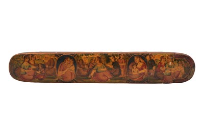 Lot 200 - A QAJAR LACQUERED PAPIER-MÂCHÉ PEN CASE (QALAMDAN)