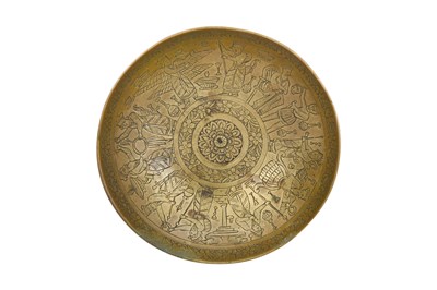 Lot 227 - A QAJAR INCISED BRASS SAUCER WITH ACHAEMENID-REVIVAL ZOROASTRIAN SCENES