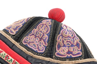 Lot 52 - A CHINESE EMBROIDERED SILK HAT