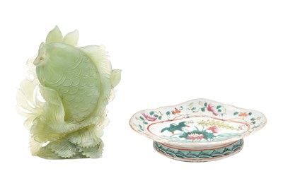 Lot 80 - A CHINESE FAMILLE ROSE STEM BOWL AND A SERPENTINE CARVING OF A CARP