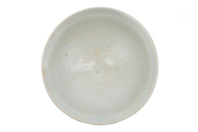 Lot 19 - A CHINESE QINGBAI 'PEONY' BOWL