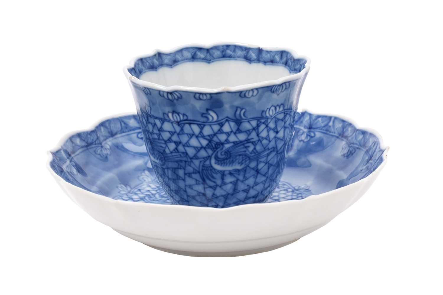 Lot 59 - A CHINESE BLUE AND WHITE 'CRANES' CUP AND SAUCER