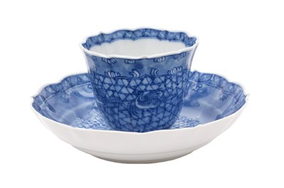 Lot 59 - A CHINESE BLUE AND WHITE 'CRANES' CUP AND SAUCER