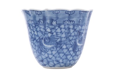 Lot 59 - A CHINESE BLUE AND WHITE 'CRANES' CUP AND SAUCER