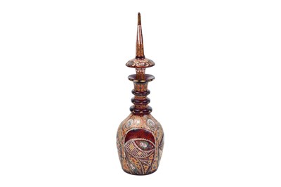 Lot 267 - AN INTACT RED AND GILT BOHEMIAN URANIUM CUT-GLASS SPIRIT DECANTER FOR THE IRANIAN EXPORT MARKET