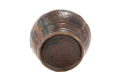 Lot 32 - A CHINESE SHIWAN POTTERY ALMS BOWL