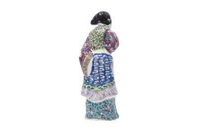 Lot 91 - A CHINESE FAMILLE ROSE ENAMELLED FIGURE OF A LADY