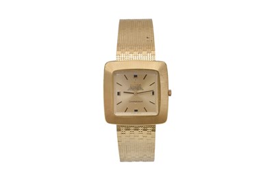 A UNIQUE ELVIS PRESLEY & COL. TOM PARKER OMEGA 18K YELLOW GOLD AUTOMATIC BRACELET WATCH.