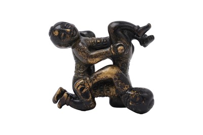 Lot 41 - A CHINESE BRONZE 'HEHE ERXIAN' PAPERWEIGHT