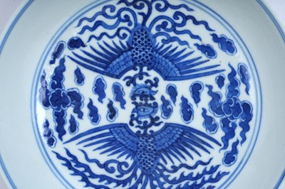 Lot 63 - A CHINESE BLUE AND WHITE 'PHOENIX' DISH