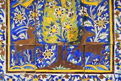 Lot 21 - A LARGE SAFAVID-STYLE POTTERY TILES PANEL