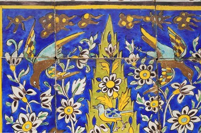 Lot 21 - A LARGE SAFAVID-STYLE POTTERY TILES PANEL