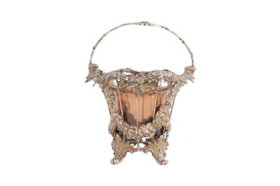 Lot 22 - A VICTORIAN PIERCED SILVER SWING HANDLED BASKET