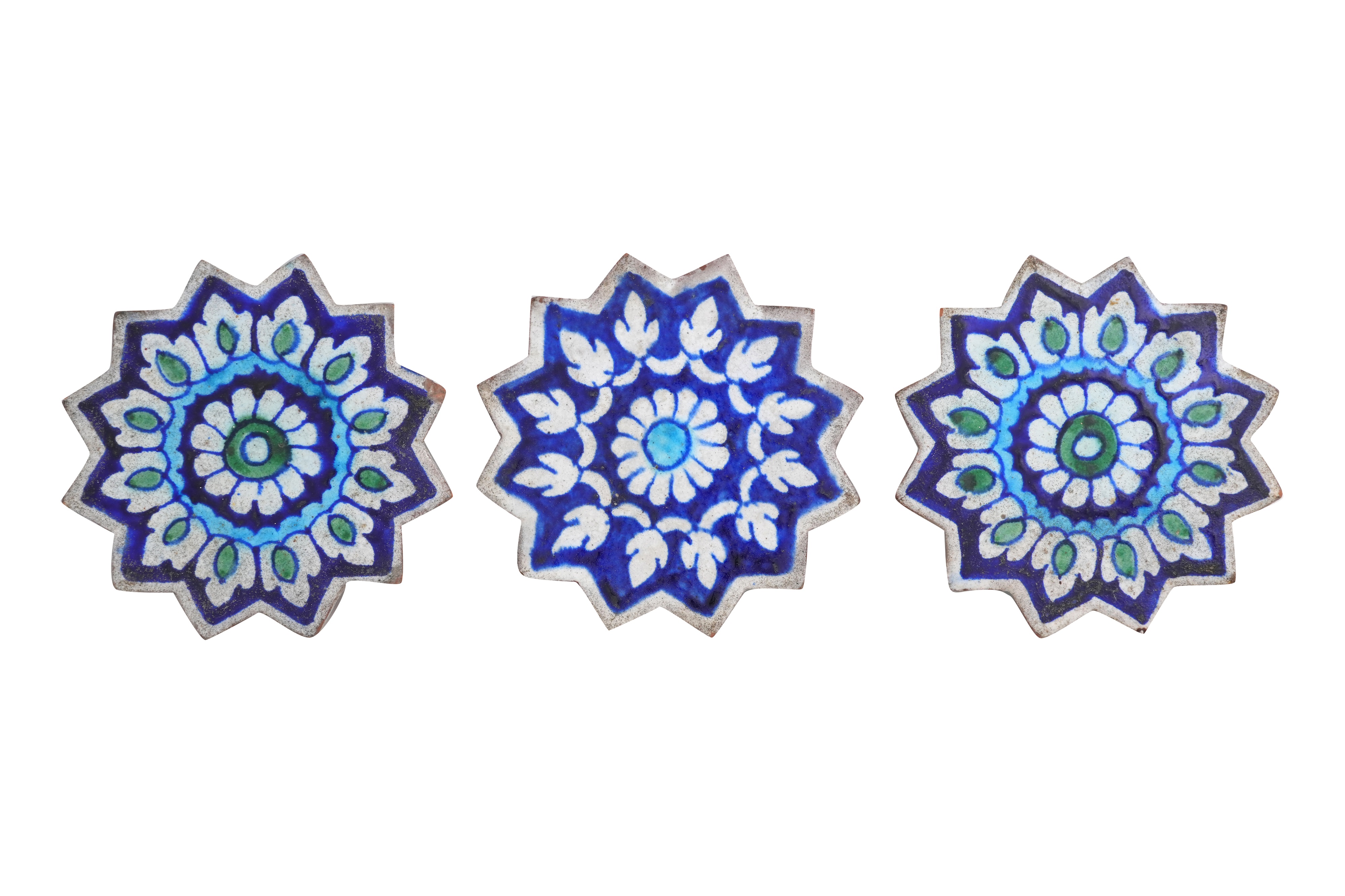 Lot 25 - THREE MULTAN POTTERY STAR SHAPED TILES