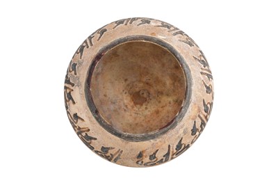 Lot 3 - A NISHAPUR POTTERY BOWL WITH KUFIC CALLIGRAPHY