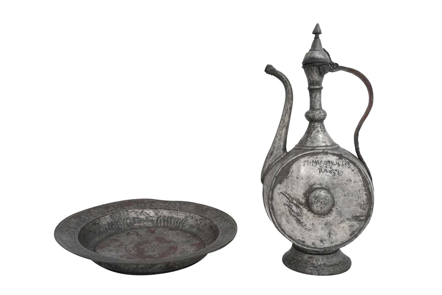 Lot 39 - AN OTTOMAN ARMENIAN TINNED COPPER EWER AND DISH