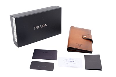 Lot 195 - PRADA GRAINED TANNED LEATHER CONTINENTAL WALLET