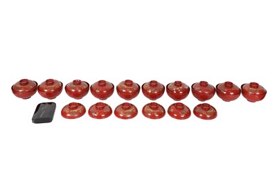 Lot 199 - A SET OF TEN JAPANESE RED LACQUER SOUP BOWLS AND LIDS