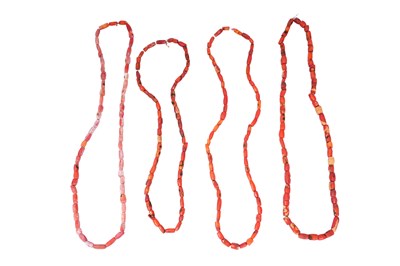 Lot 4 - FOUR ROWS OF BARREL FORM CORAL BEAD NECKLACES