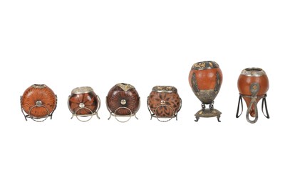 Lot 70 - SIX YERBA MATE CALABASH GOURD CUPS WITH WHITE METAL STANDS