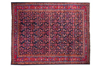Lot 102 - A BLUE GROUND AFGHAN CARPET