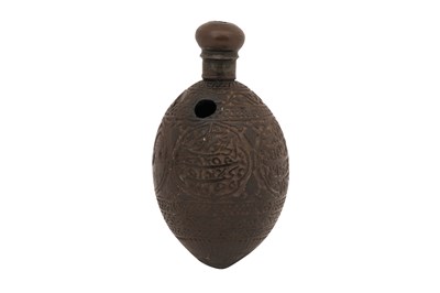 Lot 258 - A PERSIAN CARVED COCONUT HOOKAH BASE