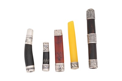 Lot 227 - A GROUP OF FIVE WOOD AND AMBER-TYPE MOUTHPIECES