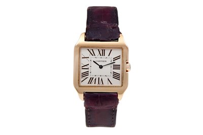 AN ELEGANT AND RARE CARTIER UNISEX 18K ROSE GOLD QUARTZ WRISTWATCH.