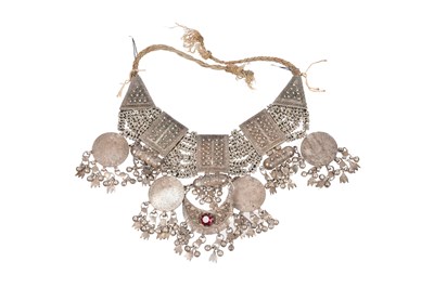 Lot 240 - A BEDOUIN MULTI-STRAND SILVER NECKLACE WITH MARIA THERESA THALER COINS