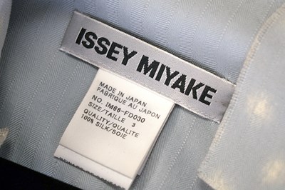 Lot 86 - AN ISSEY MIYAKE SILK ASYMMETRICAL CELADON ENSEMBLE (TWO)