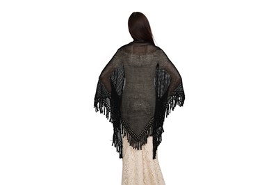 Lot 63 - DOLCE & GABBANA BLACK FRINGED OPEN WEAVE SHAWL