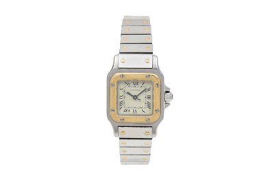 AN ELEGANT CARTIER LADIES AUTOMATIC STAINLESS STEEL AND 18K YELLOW GOLD BRACELET WATCH.