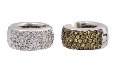 Lot 45 - A PAIR OF 18CT WHITE GOLD DIAMOND AND TOPAZ HUGGIE HOOP EARRINGS