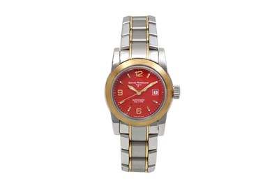 A GIRARD PERREGAUX LADIES STAINLESS STEEL AND GOLD BRACELET WATCH.
