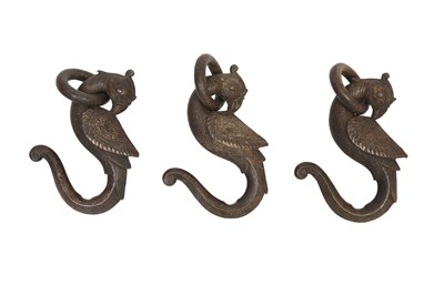 Lot 21 - THREE CAST BRASS PARROT-SHAPED HANGING HOOKS