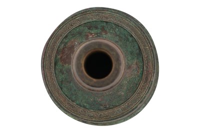Lot 29 - AN AYYUBID BRONZE CANDLESTICK