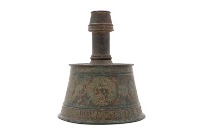 Lot 29 - AN AYYUBID BRONZE CANDLESTICK