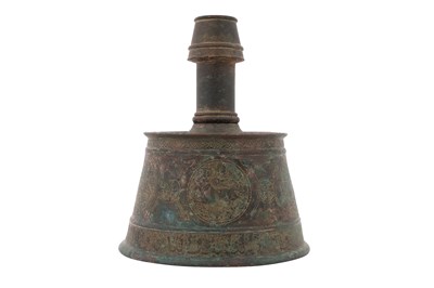 Lot 29 - AN AYYUBID BRONZE CANDLESTICK