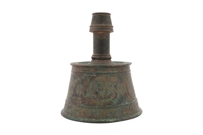 Lot 29 - AN AYYUBID BRONZE CANDLESTICK