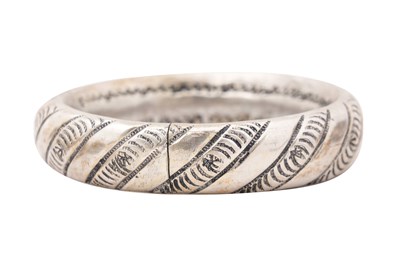 Lot 67 - A COLLECTION OF RIGID INDIAN SILVER BRACELETS AND BANGLES (FIVE)