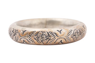 Lot 67 - A COLLECTION OF RIGID INDIAN SILVER BRACELETS AND BANGLES (FIVE)