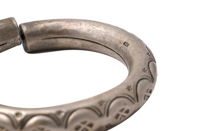 Lot 67 - A COLLECTION OF RIGID INDIAN SILVER BRACELETS AND BANGLES (FIVE)