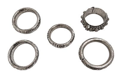 Lot 67 - A COLLECTION OF RIGID INDIAN SILVER BRACELETS AND BANGLES (FIVE)